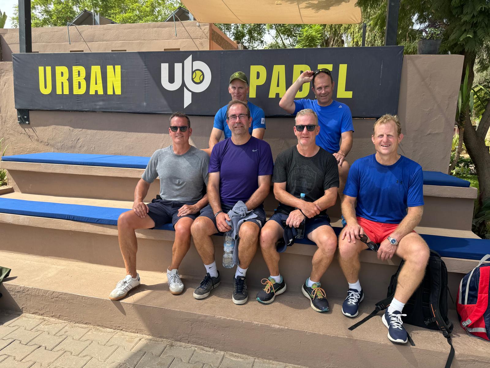 The padel group seated together