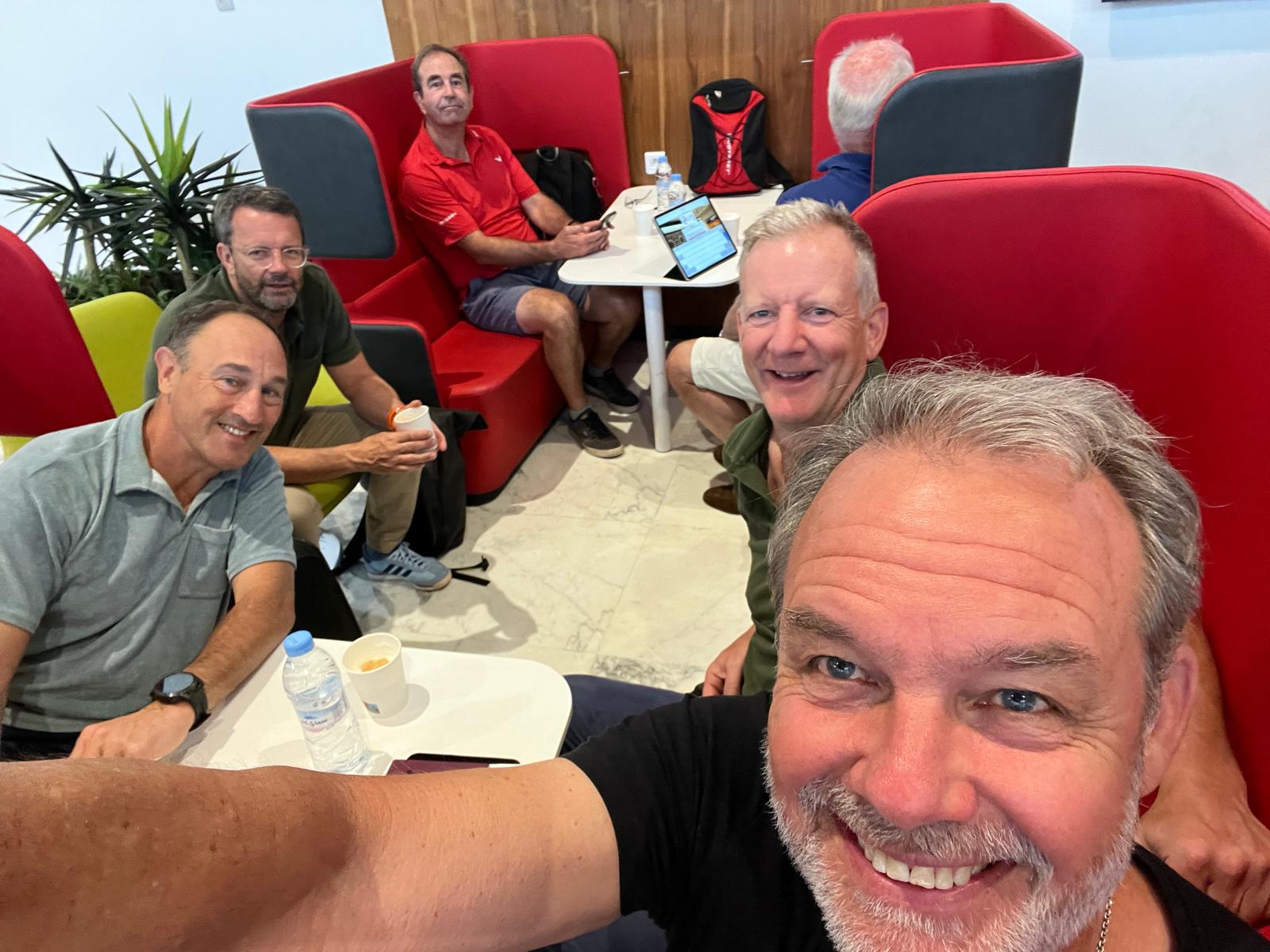 A group selfie at the airport